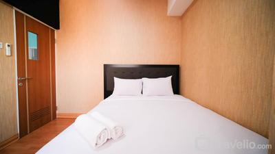 Apartemen Puncak Dharmahusada - Homey 2BR with Extra Room at Puncak Dharmahusada Apartment By Travelio