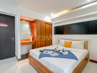 Wooden Touch Studio at Kebagusan City Apartment By Travelio