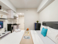 Cozy Studio with Direct Access to Pool and Gym Springlake Summarecon Bekasi By Travelio
