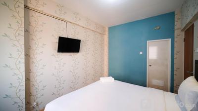 Apartemen Puncak Dharmahusada - Homey 2BR with Extra Room at Puncak Dharmahusada Apartment By Travelio