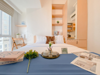 Minimalist Peach Touch Studio Apartment at Tokyo Riverside PIK 2 By Travelio
