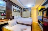 Cozy and Enjoy Living Studio Green Bay Pluit Apartment By Travelio