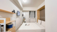 Basic Studio (No Kitchen) near UNHAS Bandaraya - Tallasa City Makassar Apartment By Travelio