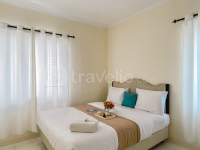 Homey and Modern 2BR at  Marina Ancol Apartment By Travelio