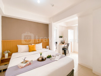 Comfy Warm Tone 1BR at Apartment Bassura City By Travelio