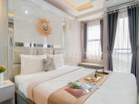 Modern Minimalist Studio at Transpark Cibubur Apartment By Travelio