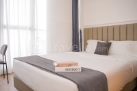 Cozy Living 2BR at Gold Coast Apartment By Travelio