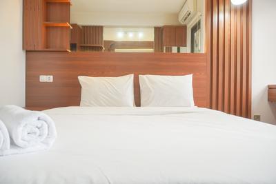 Relaxing and Homey Studio Transpark Cibubur Apartment By Travelio