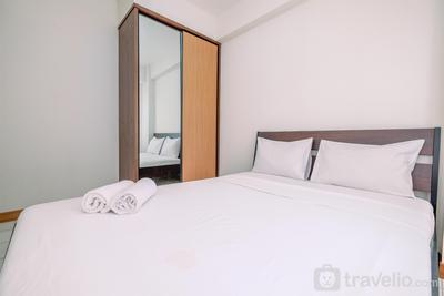 Tidy and Comfortable 2BR Podomoro Golf View Apartment By Travelio