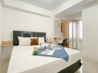 1BR with Sofa Bed at Bassura City Apartment By Travelio