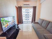 Cozy and Restful 2BR at Puncak Bukit Golf Apartment By Travelio