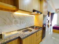 Apartemen Grand Dharmahusada Lagoon - Wood Accents Studio at Grand Dharmahusada Lagoon Apartment by Travelio