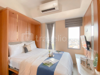 Cozy and Enjoy Living Studio at Pesona Square Depok Apartment By Travelio