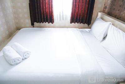 Apartemen Mutiara Bekasi - Pool View 2BR Mutiara Bekasi Apartment By Travelio