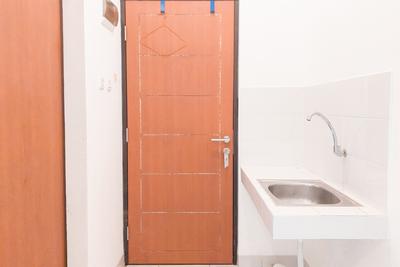 Apartemen Eco Home Residence - Comfy Unfurnished Studio Apartment with AC at Eco Home Residence By Travelio