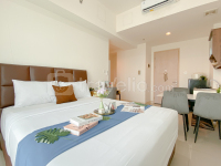 Spacious and Modern Studio Apartment Tree Park City BSD By Travelio