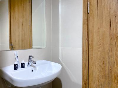 Apartemen LRT City Jatibening - Modern Look Studio at Gateway Park LRT City Bekasi Apartment By Travelio