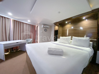 Cozy and Minimalist 1BR Sentraland Semarang Apartment By Travelio
