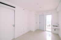 2BR Unfurnished at 17th Floor Bassura City Apartment By Travelio