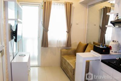 Minimalist and Homey 2BR Apartment at Green Pramuka City near Mall By Travelio