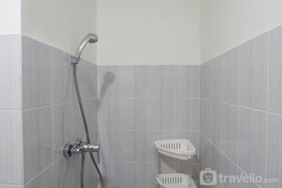 Apartemen Puncak Dharmahusada - Exquisite 2BR Apartment at Puncak Dharmahusada By Travelio