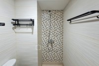 Apartemen Cisauk Point - Warm Wooden Touch Studio Room at Apartment Cisauk Point By Travelio