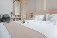 Apartemen Grande Valore Condominium - Wonderful and Pool View 1BR Apartment Grande Valore Condominium By Travelio