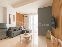 Modern Monochromatic 2BR near LRT Station at Apartment Samara Suites By Travelio