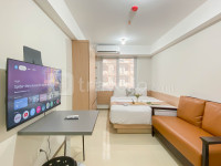 Comfy Studio Room at Meikarta Apartment By Travelio