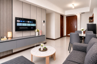 Fully Furnished and Homey 2BR Apartment at Casa Grande Residence By Travelio