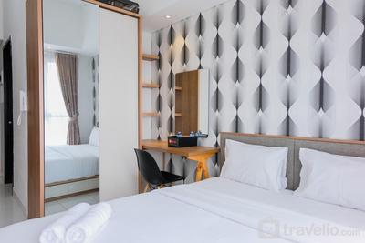 Homey and Comfy Studio Casa de Parco Apartment By Travelio