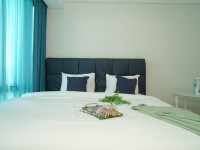 Apartemen Capitol Suites - Chic and Warm Studio Room at Apartment Capitol Suites By Travelio