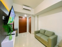Spacious and Relaxing 2BR Apartment at Corner Vittoria Residence By Travelio