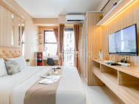 Warm Contemporary Studio Apartment at Transpark Cibubur By Travelio