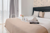 Modern Look Studio at Grand Kamala Lagoon Apartment By Travelio