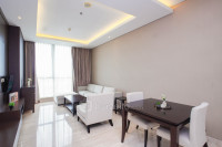 Modern and Comfy 2BR with Extra Room at Four Winds Apartment By Travelio