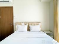 Spacious and Nice 2BR at Puri Orchard Apartment By Travelio