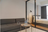 Comfort Living and Homey 1BR The Smith Alam Sutera Apartment By Travelio