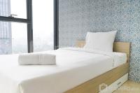 South Tower 2BR at L'Avenue Apartment By Travelio