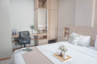 Apartemen Grande Valore Condominium - Wonderful and Pool View 1BR Apartment Grande Valore Condominium By Travelio