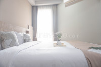 Apartemen Grande Valore Condominium - Wonderful and Pool View 1BR Apartment Grande Valore Condominium By Travelio