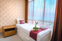 Cozy and Minimalist Space 2BR at Tamansari Papilio Apartment By Travelio