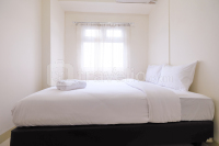 Basic 2BR with City View at Green Pramuka City Apartment By Travelio
