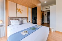 Apartemen Casa de Parco - Wooden Tone Studio at Casa de Parco Apartment By Travelio