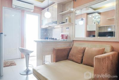 Homey and Fresh 2BR Green Pramuka City Apartment By Travelio