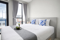 Apartemen Monroe Tower - Wooden Accents Studio at Monroe Tower Apartment By Travelio