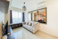 Chic and Cozy 2BR Grand Kamala Lagoon Apartment By Travelio