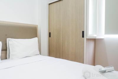 Apartemen Puncak Dharmahusada - Exquisite 2BR Apartment at Puncak Dharmahusada By Travelio