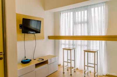 Fancy and Nice 1BR Apartment at M-Town Residence By Travelio