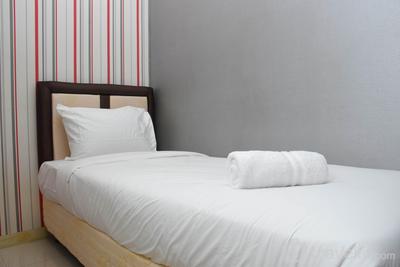 Restful and Tidy 2BR Green Pramuka City Apartment By Travelio